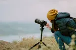 Photographer kneeling