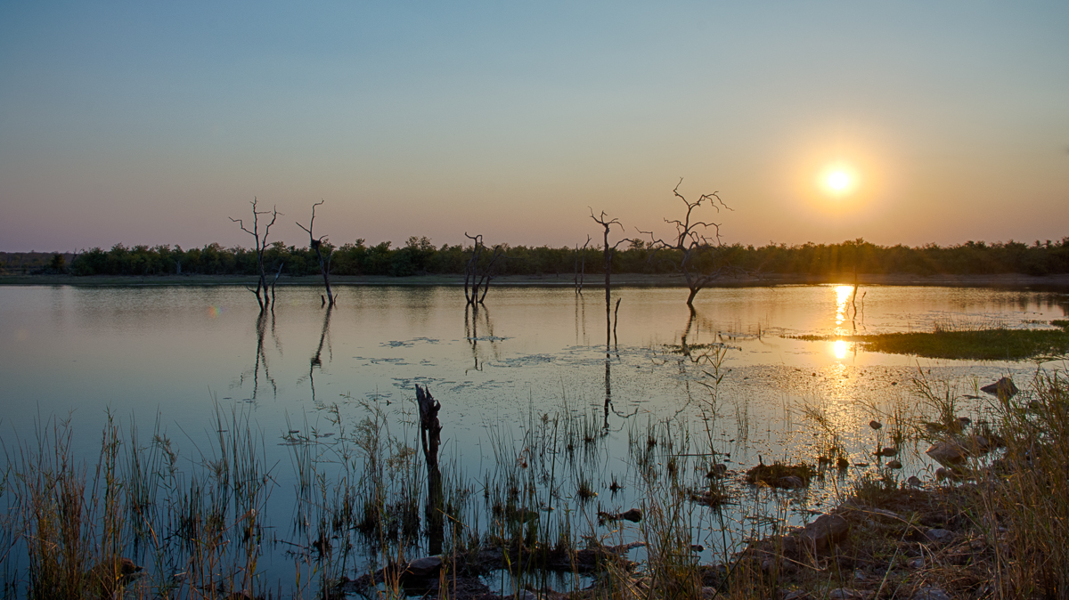 eye-level sunset of pioneer dam