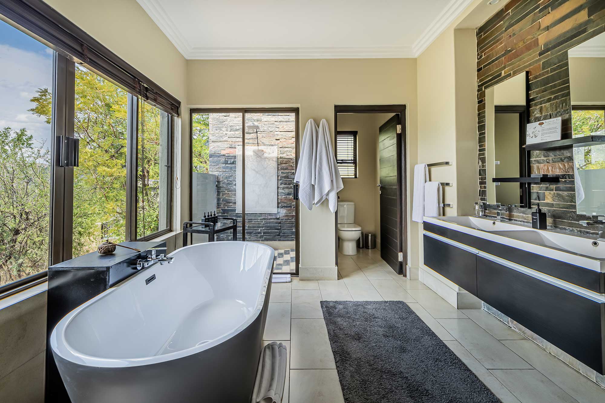 Family suite bathroom at Shepherds Tree Lodge