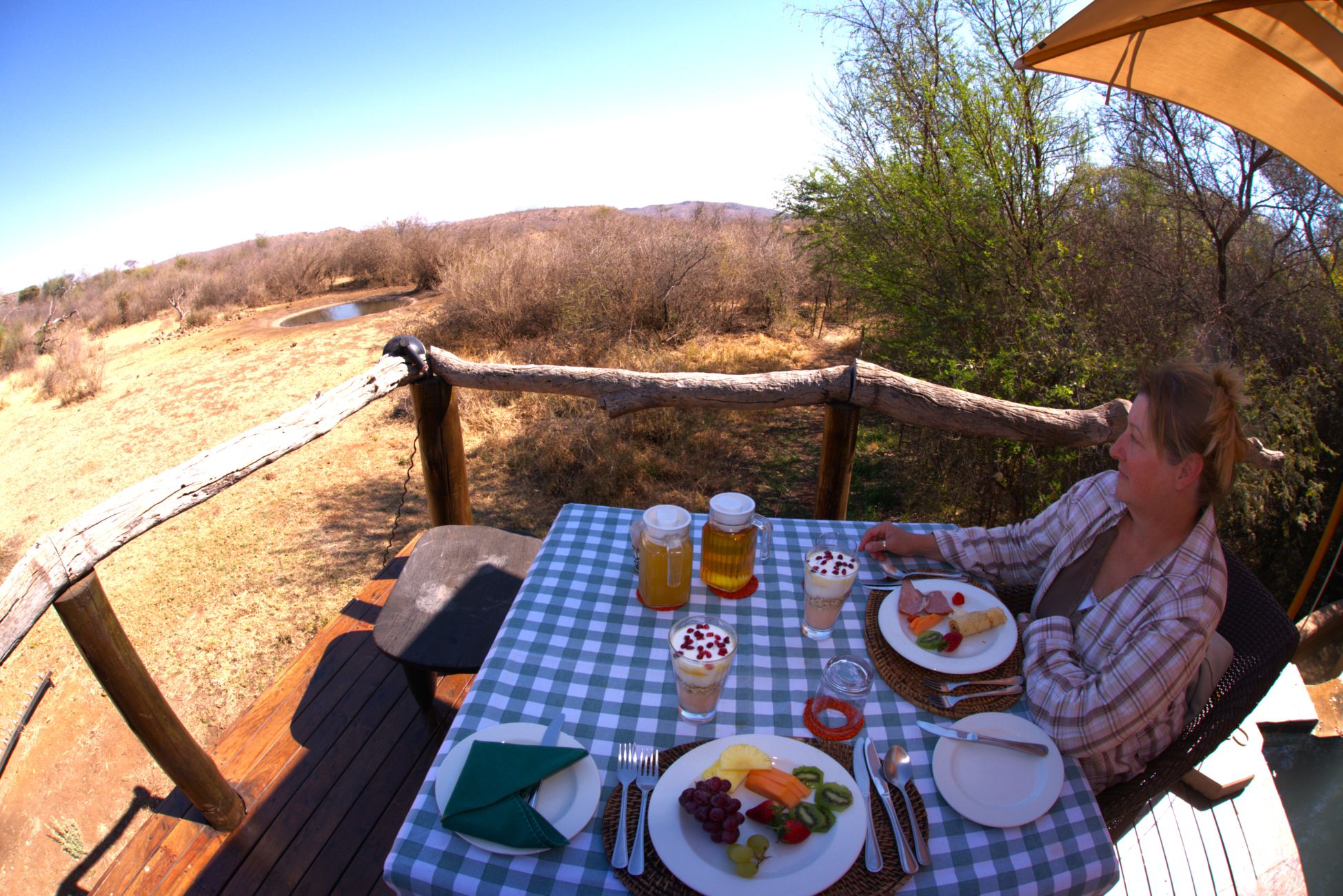 Breakfast on the deck over looking the waterhole while at Motswiri Private Safari Lodge