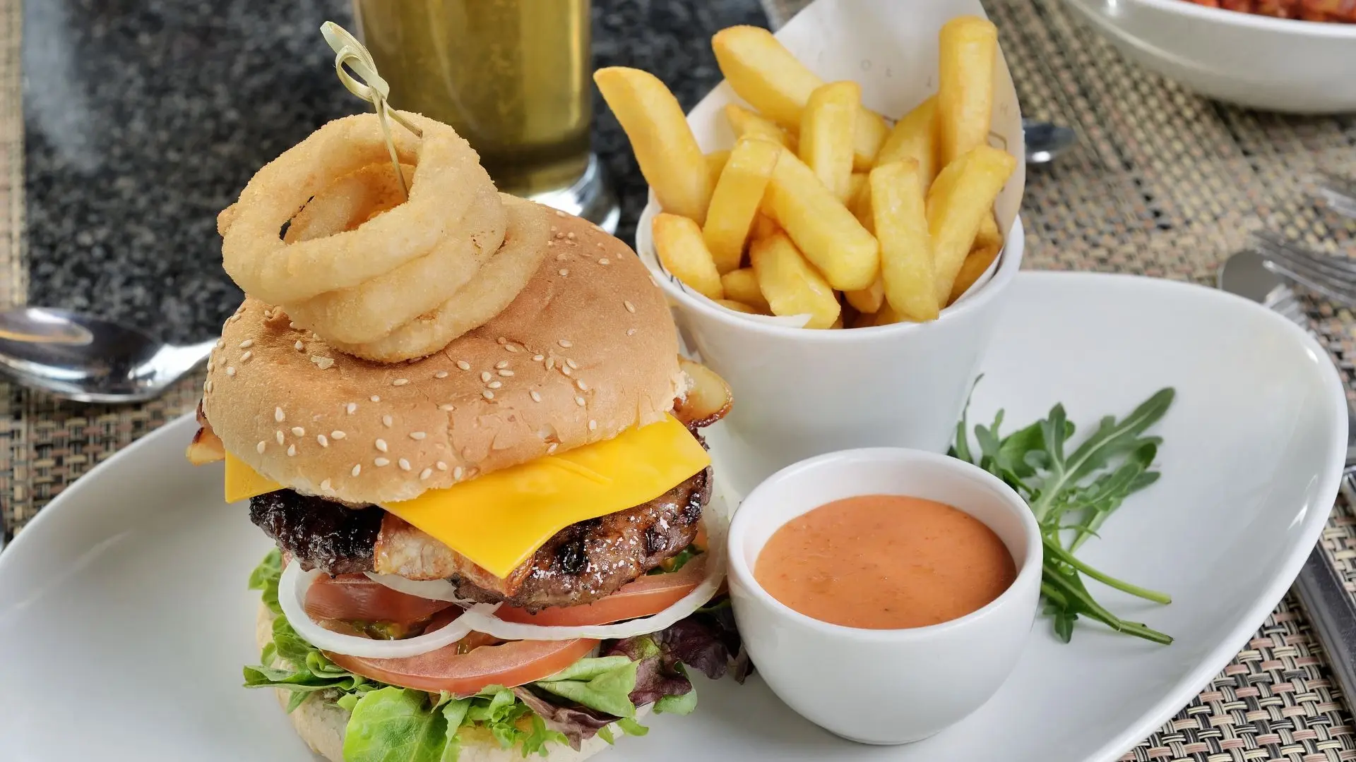 Burger and chips on the terrace at Bakubung Bush Lodge