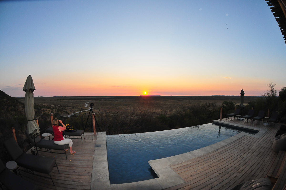 Dolomite camp pool deck at sunset