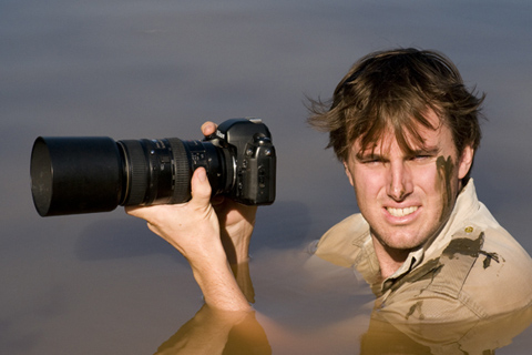 Greg du toit photographing from in the waterhole