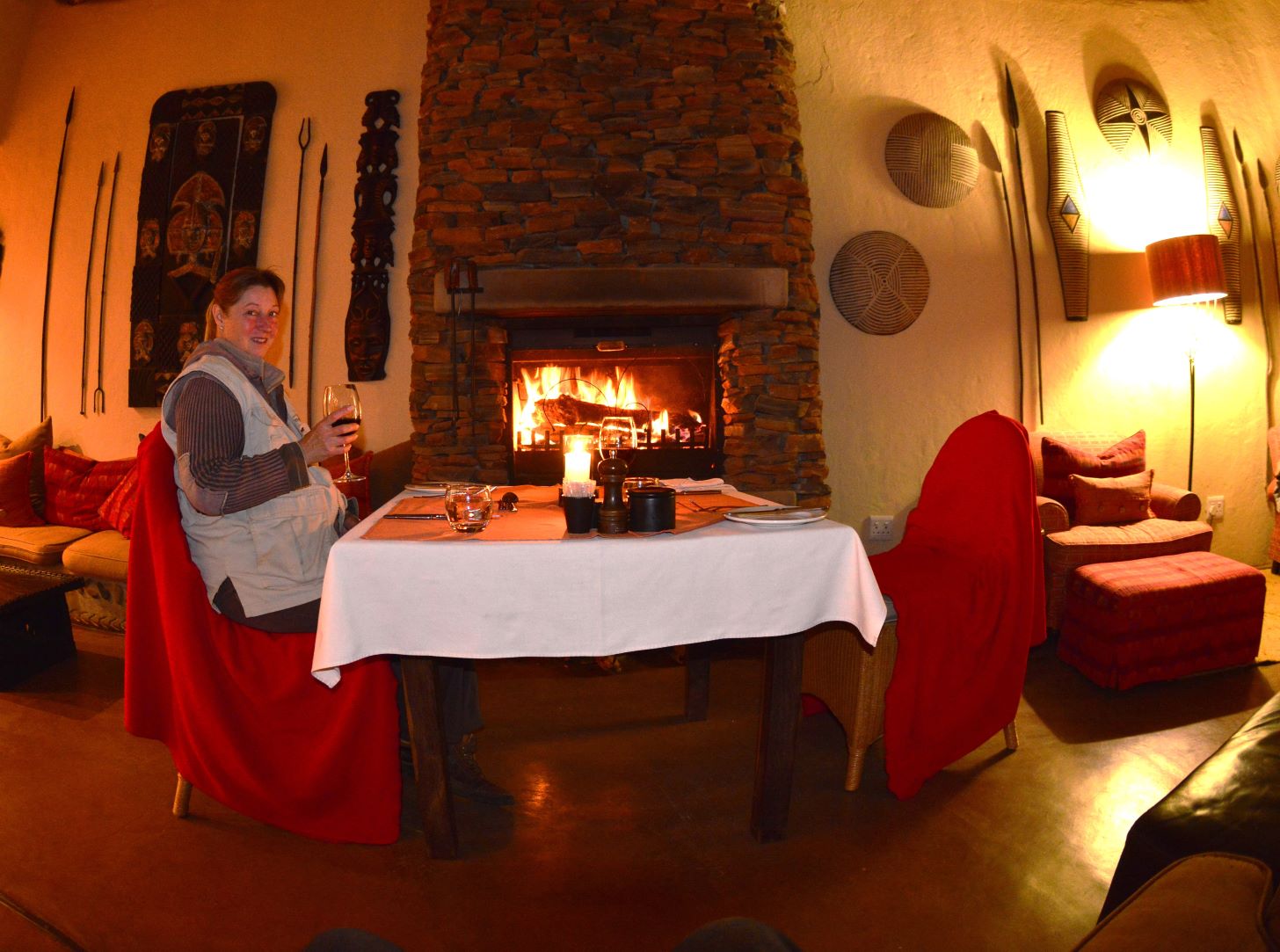 dinner in the lounge area near the fire-place at Makanyane Safari lodge