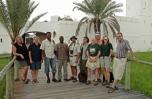 Guests on the Dr Estes Guided Safari in front of Fort Namutoni Guests on the Dr Estes Guided Safari in front of Fort Namutoni