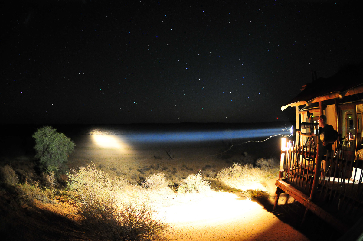 Mario shining our spotlight from our tent