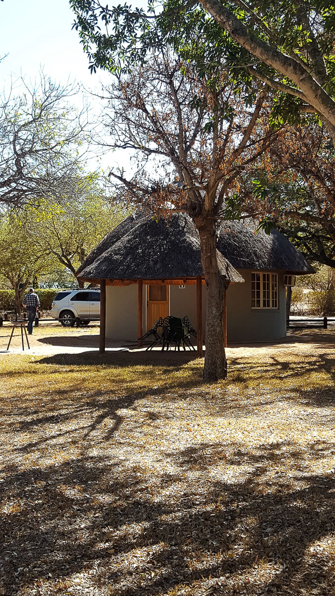 Malelane camp Bungalow under shady trees in the Kruger National Park