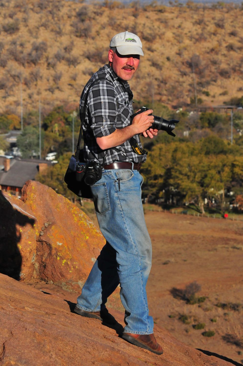 Mario photographing on the rock