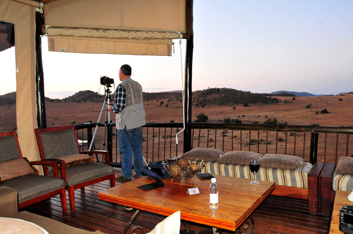 Mario photographing the setting sun from the main deck