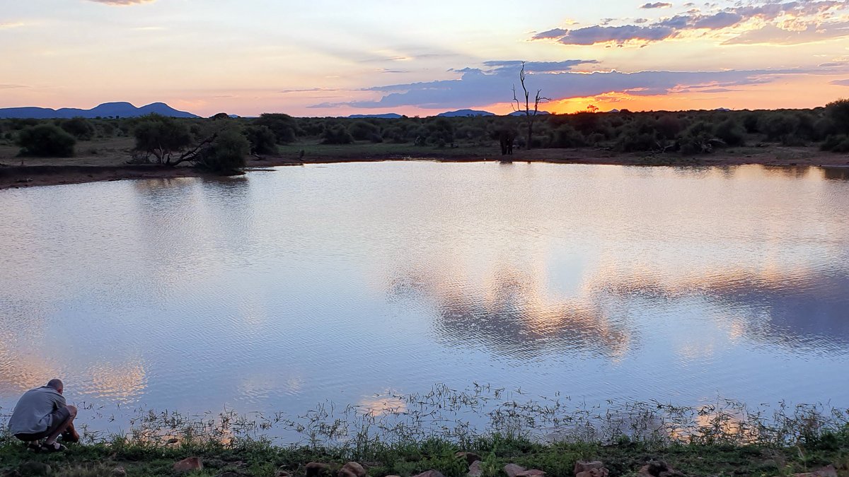 mario photographing sunset at Kolobeng dam