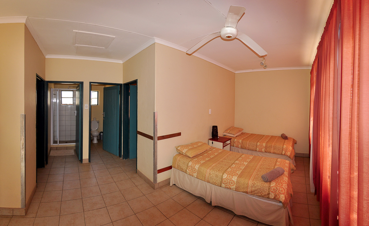 Old chalets bedroom at Mata Mata