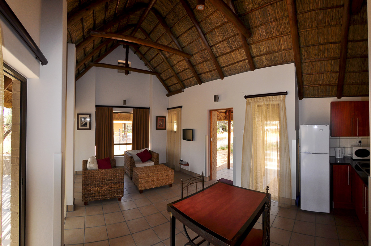 Kitchen and dining area at the River facing chalets at Mata Mata