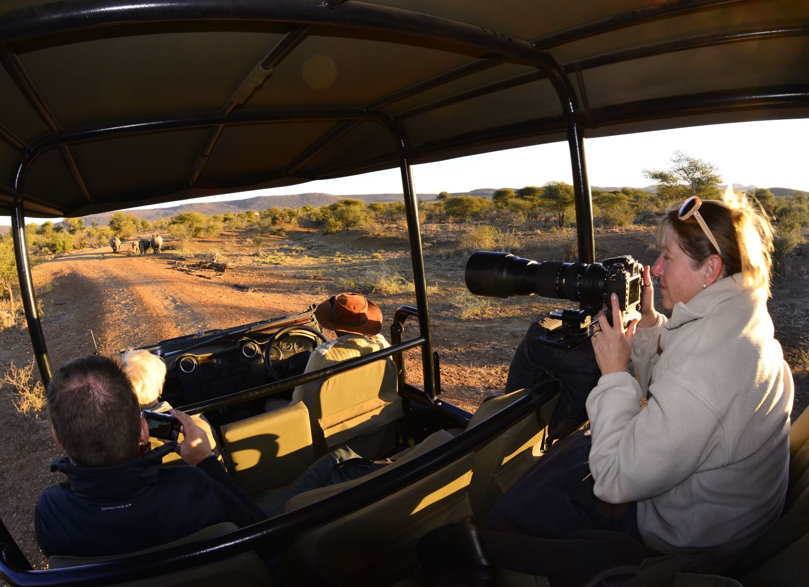 Photographing on game drive at Mosetlha Bush Camp