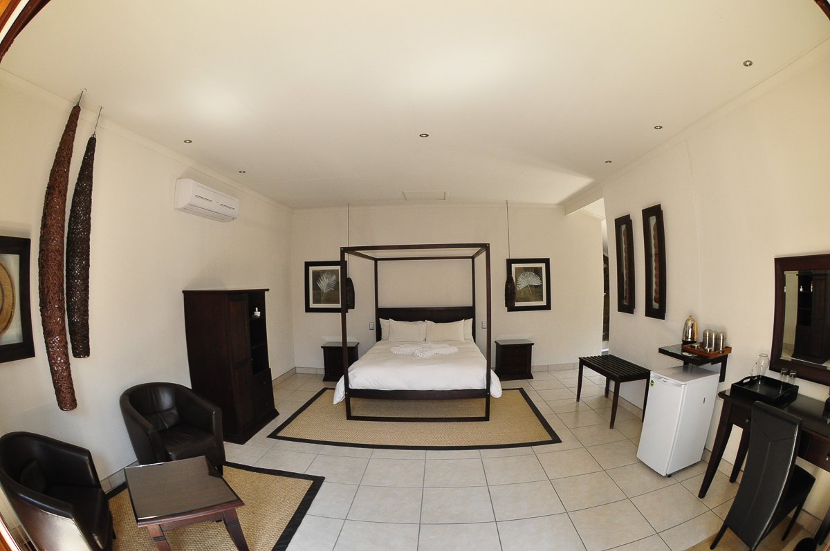 Bush chalet bedroom in Namutoni camp in Etosha