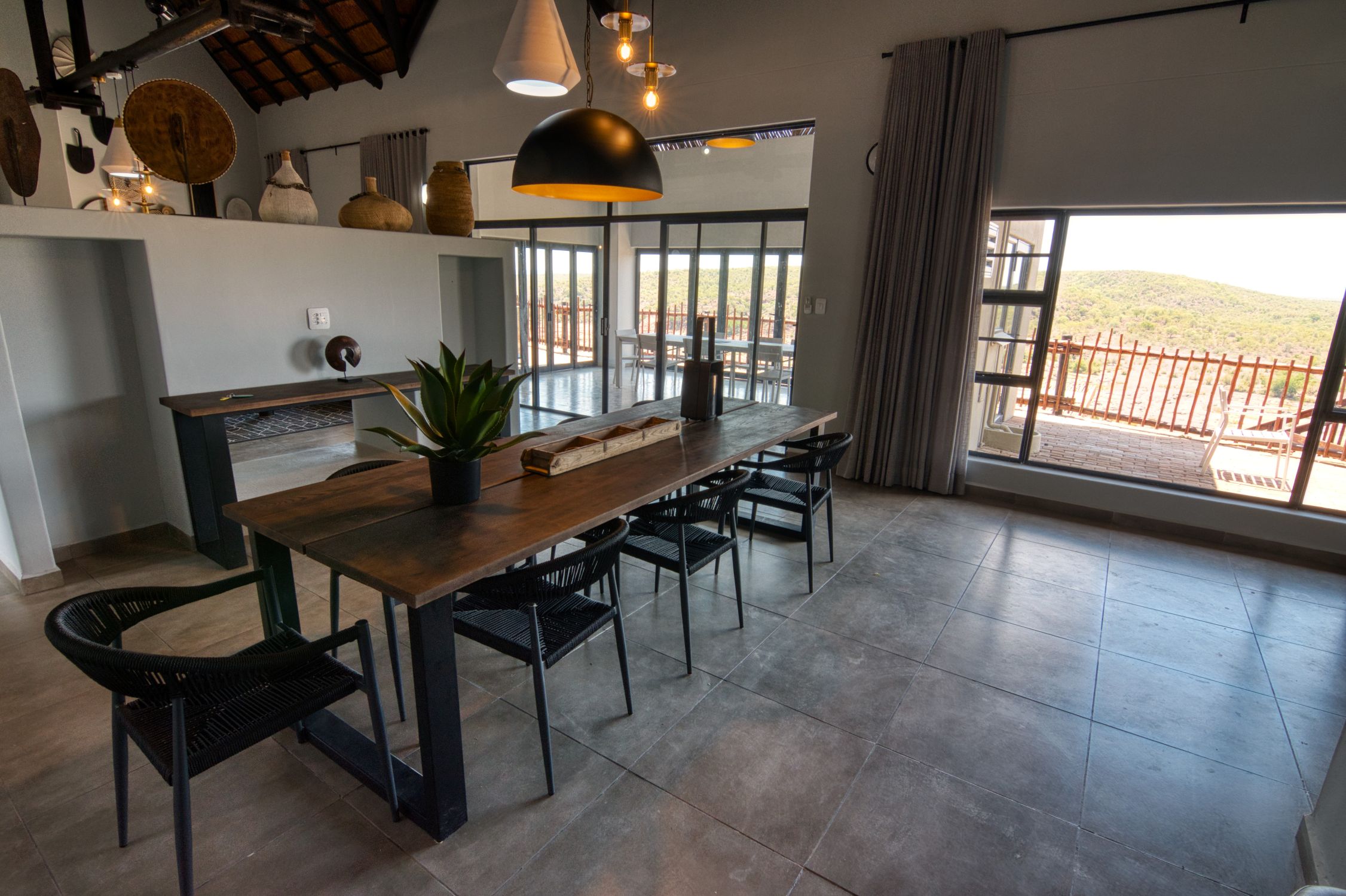 Dining room with a view at Nshawu Guest House in Olifants camp