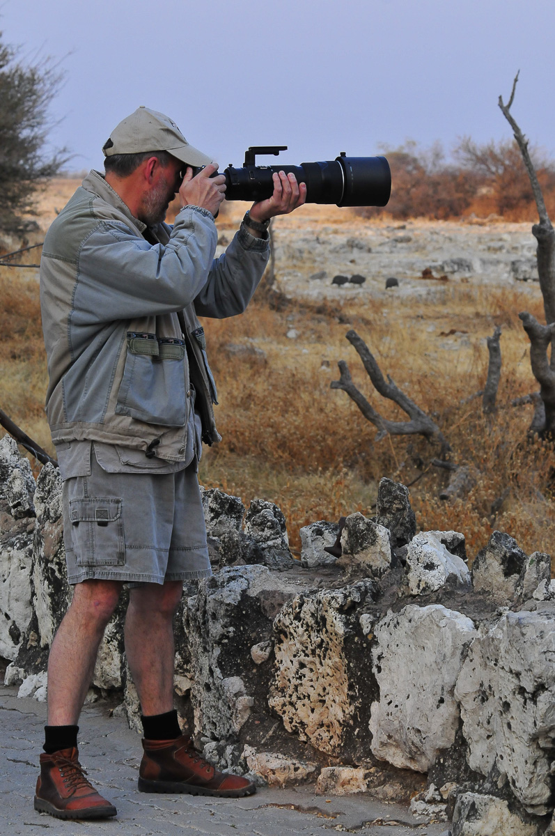 Mario photographing at Okaukuejo waterhole