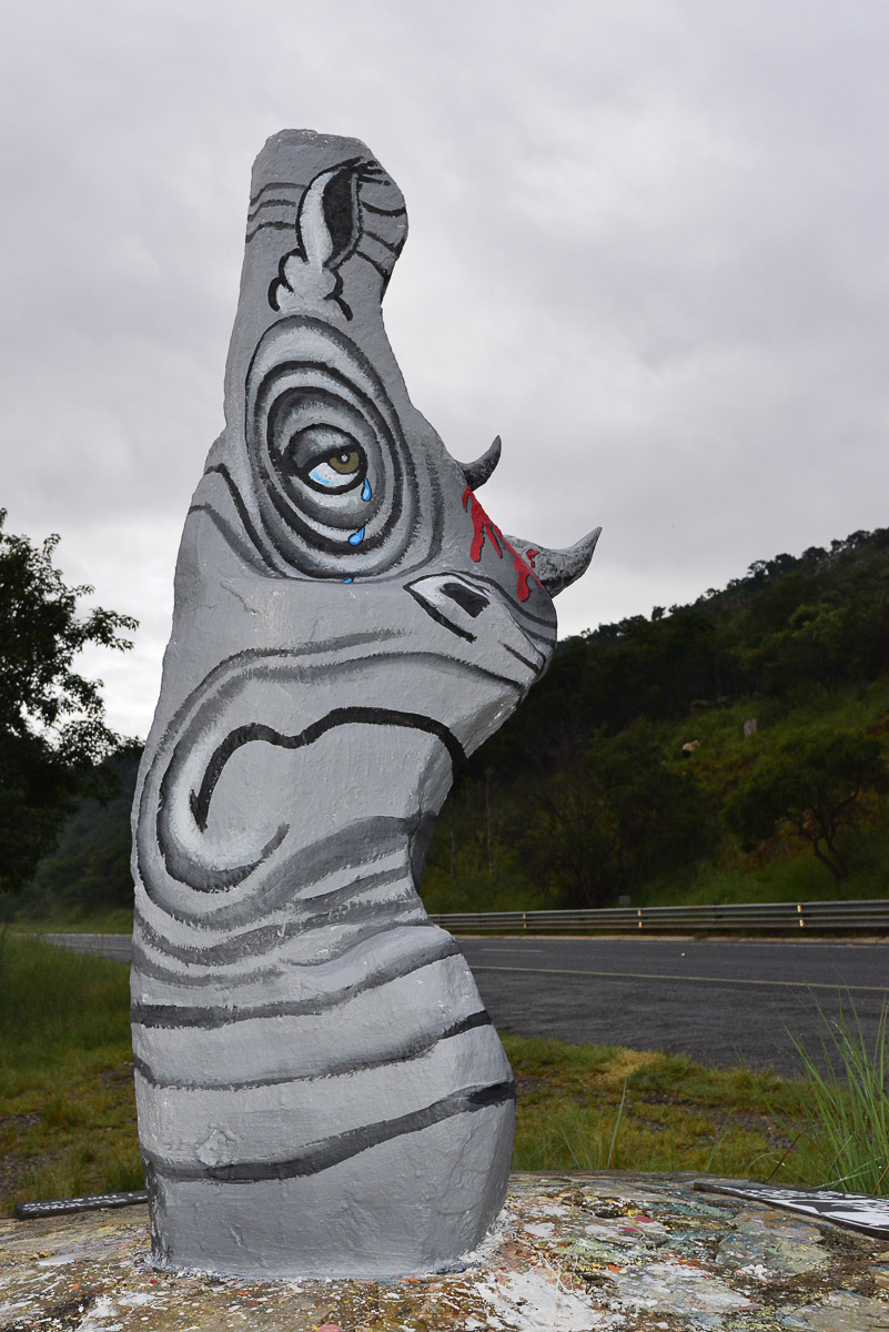 Old Joe Stone painted according to latest news item, such as rhino poaching