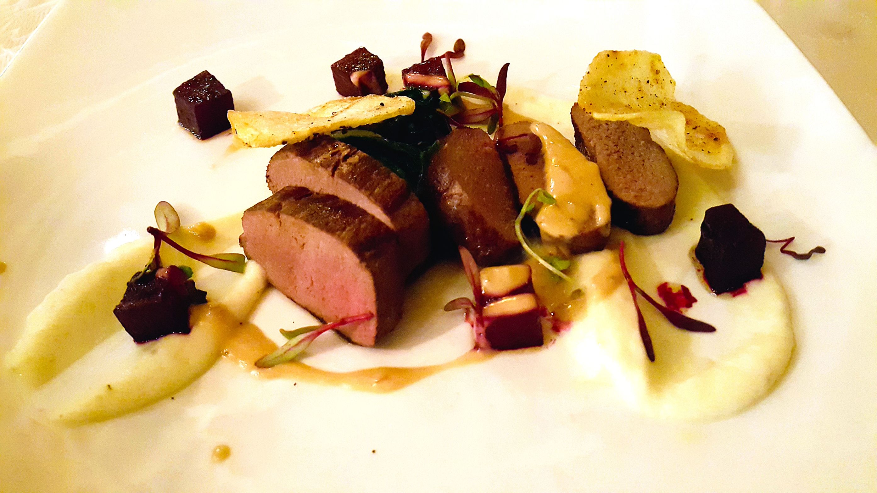 Rooibos Smoked Springbok loin on wilted greens at Etali Safari Lodge
