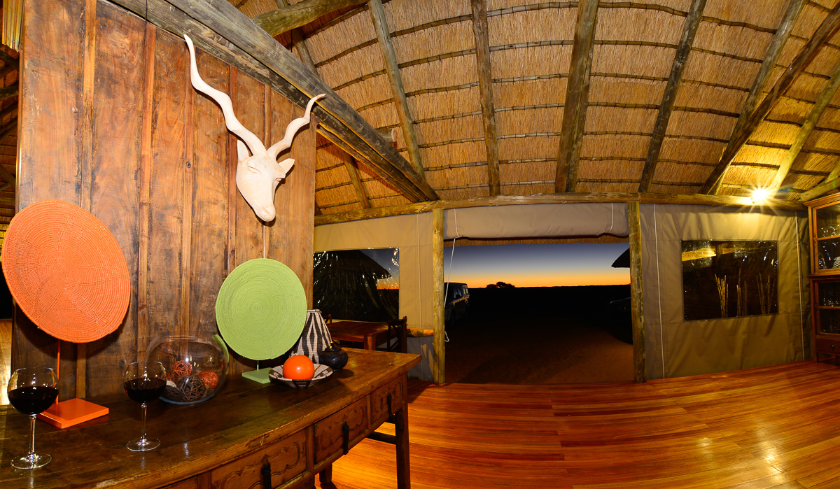 Rooiputs Lodge entrance with the setting sun