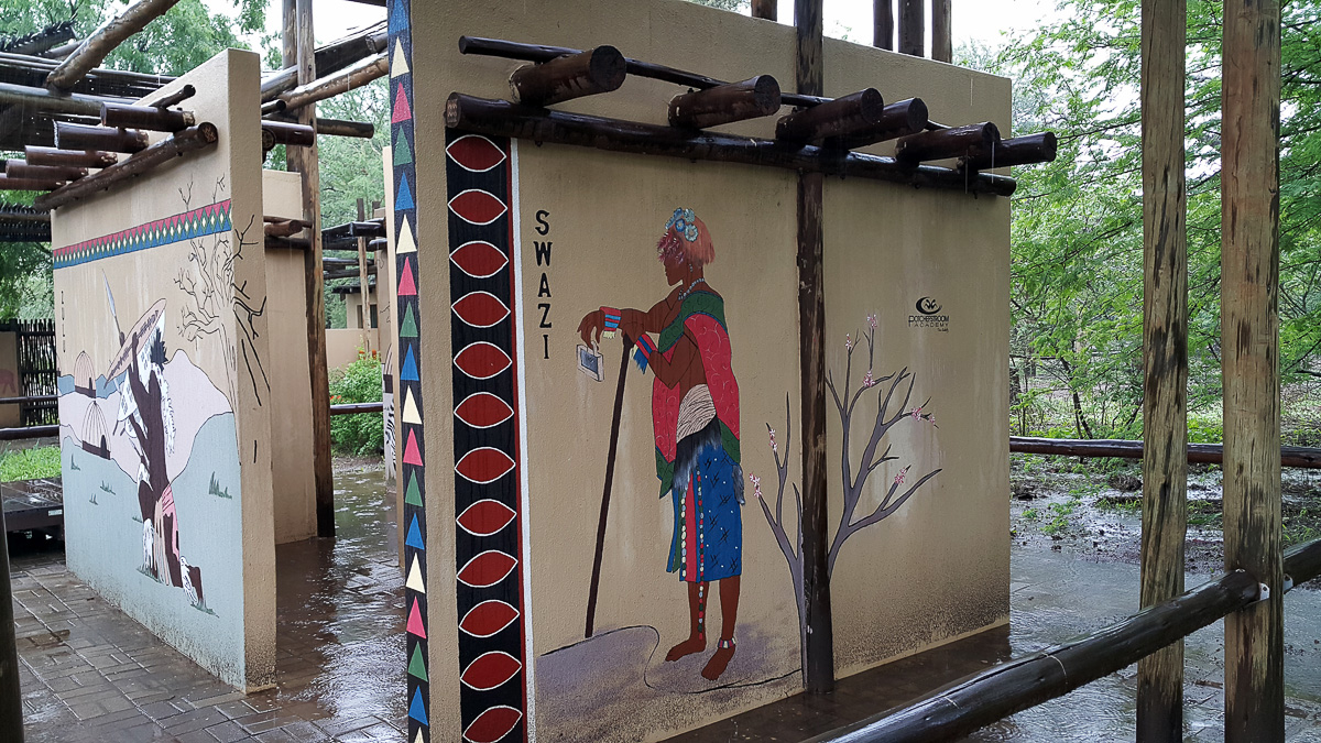 Murals on wall at day visitors area in Satara