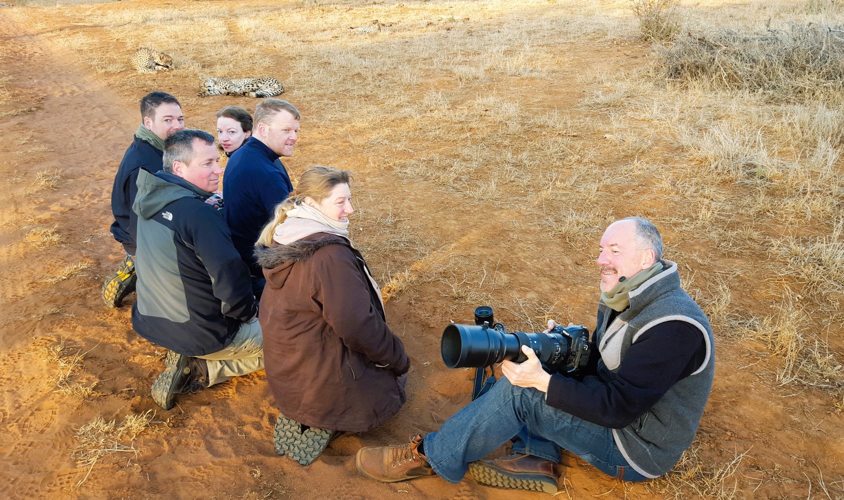 Our game drive group sitting with the cheetahs at Makanyane Safari Lodge