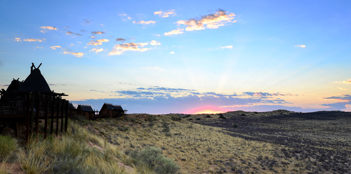 Sunrise at !Xaus lodge in the Kalahari