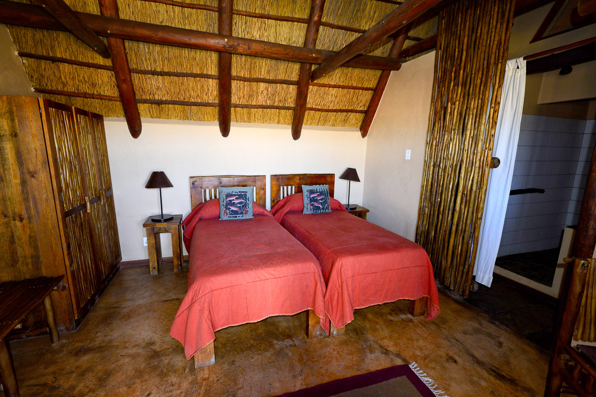 Chalet bedroom at !Xaus Lodge