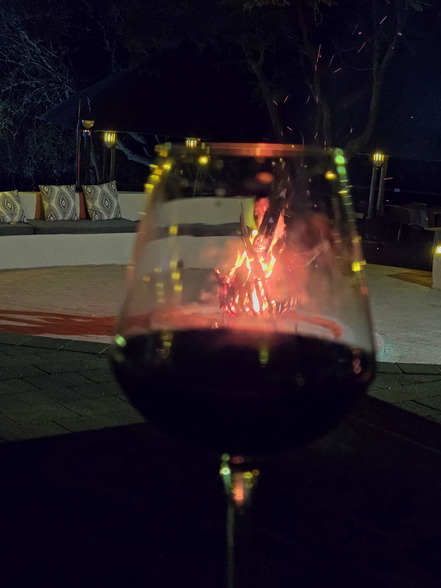 Red wine at the boma fire at Cresta Mowana Botswana