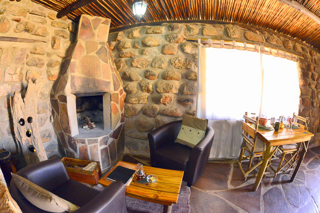 chalet showing fireplace, lounge and dining area chalet showing fireplace, lounge and dining area