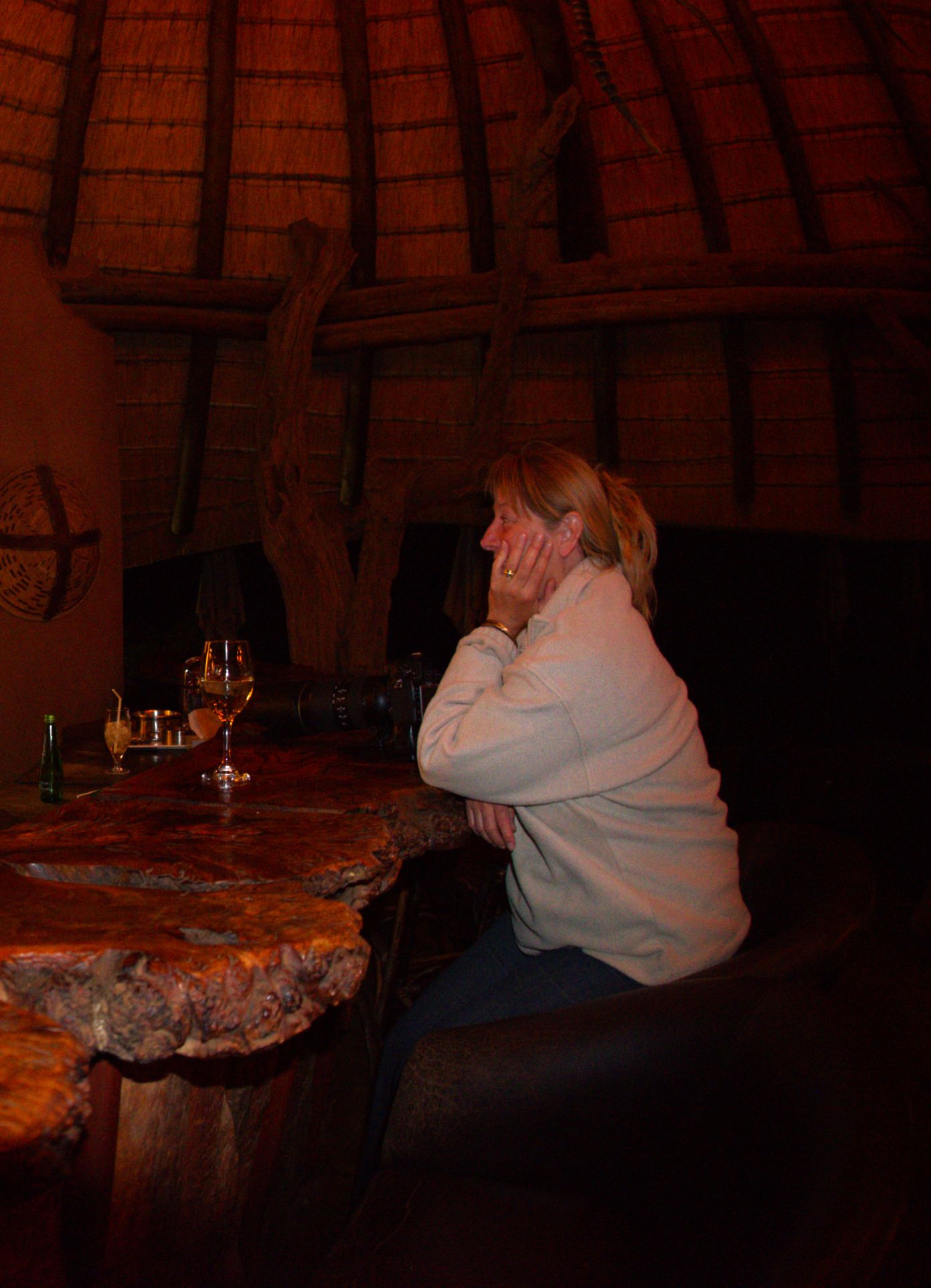 Jen at the bar after game drive at Motswiri Private Safari Lodge