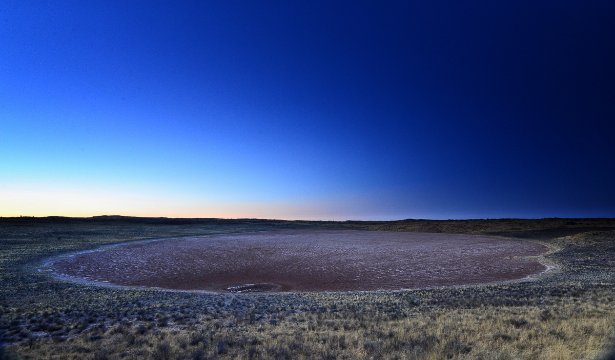 !Xaus salt pan with a beautiful sky