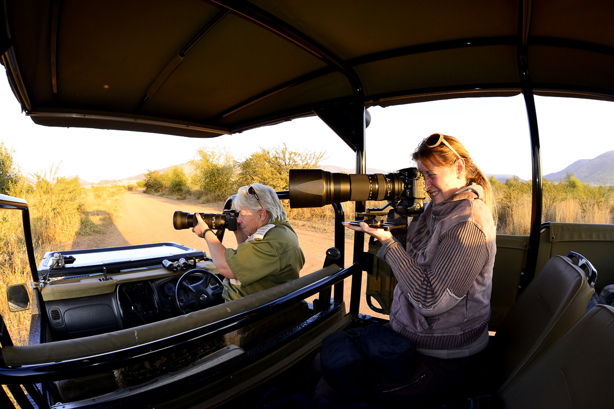 Shawn and Jenny photographing on game drive