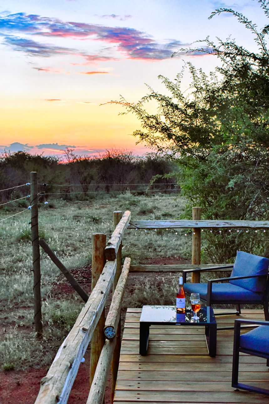 Sundowners on the wooden deck at Mosetlha Bush Camp
